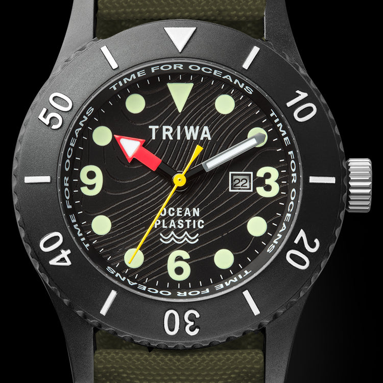 <img src="tapster.png" alt="Contactless- watch triwa sub green close up">